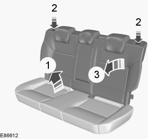 1. Introduzca los dedos entre el cojín del asiento y el respaldo para abatir