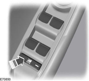 Pulse el mando para bloquear o desbloquear los mandos de la ventanilla trasera.